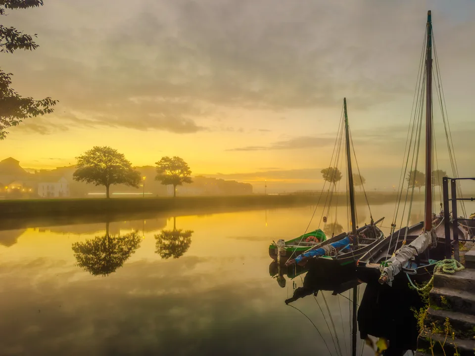 Dawn light over the Claddagh Basin in Galway