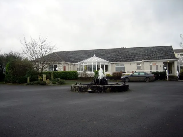 Lourdesville Nursing Home, Athy Road, Kildare town: purpose-built single-storey nursing home with conservatory and fountain in the forecourt