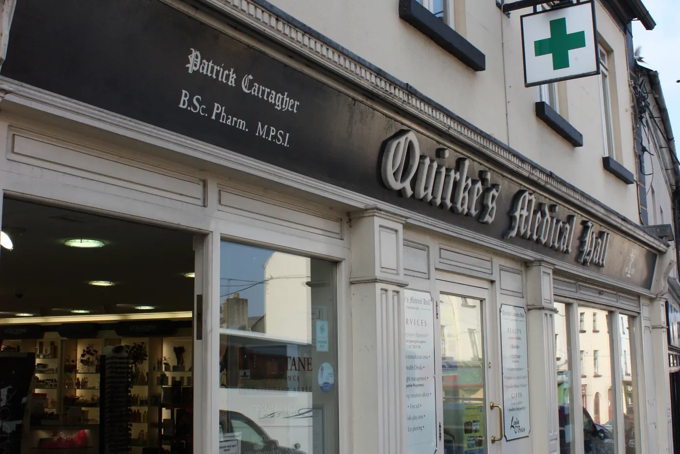 Quirke's Medical Hall pharmacy shopfront with green cross sign, High Street, Tullamore, Co. Offaly